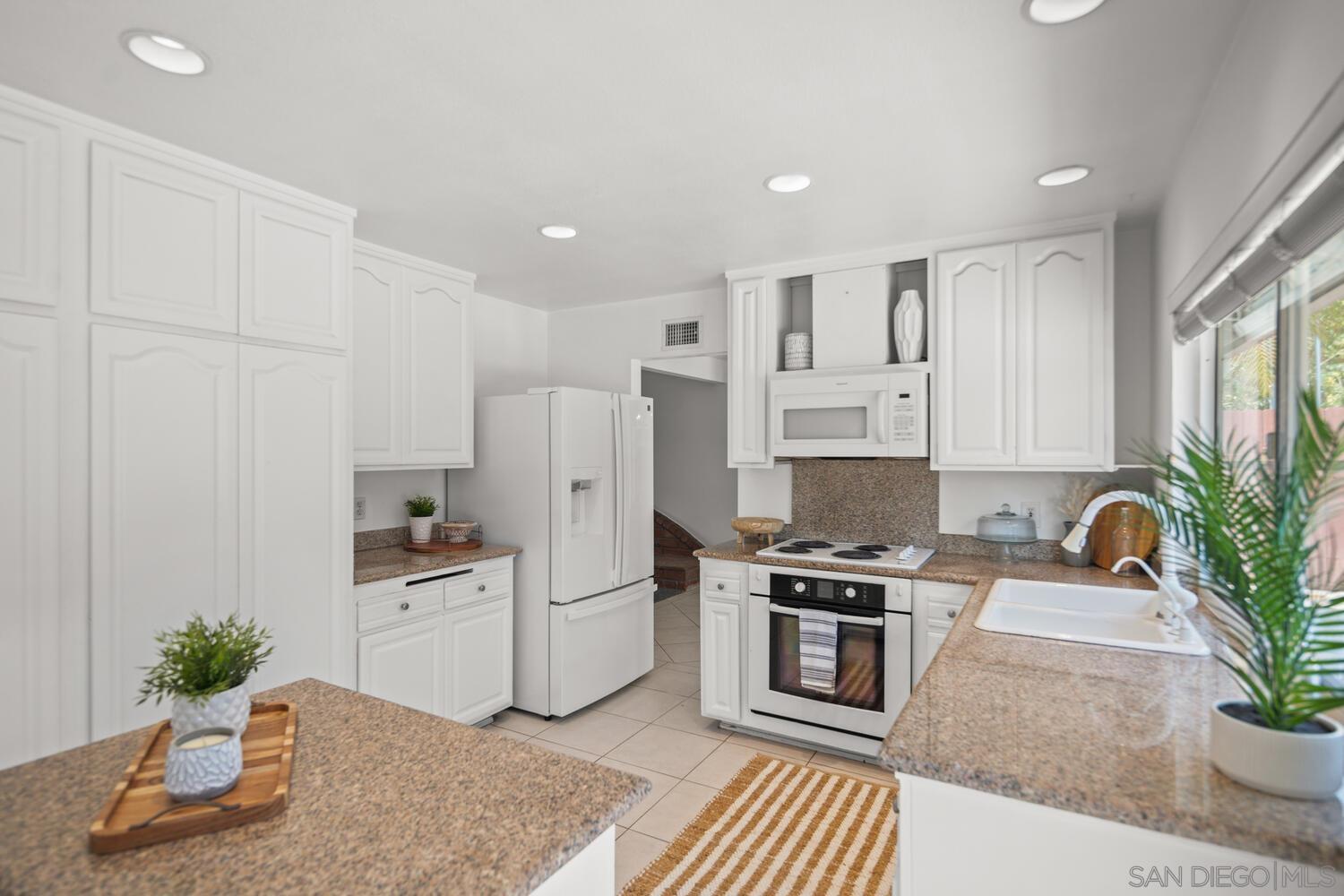 Detail Gallery Image 12 of 50 For 4135  Huerfano Ave, San Diego,  CA 92117 - 4 Beds | 2/1 Baths