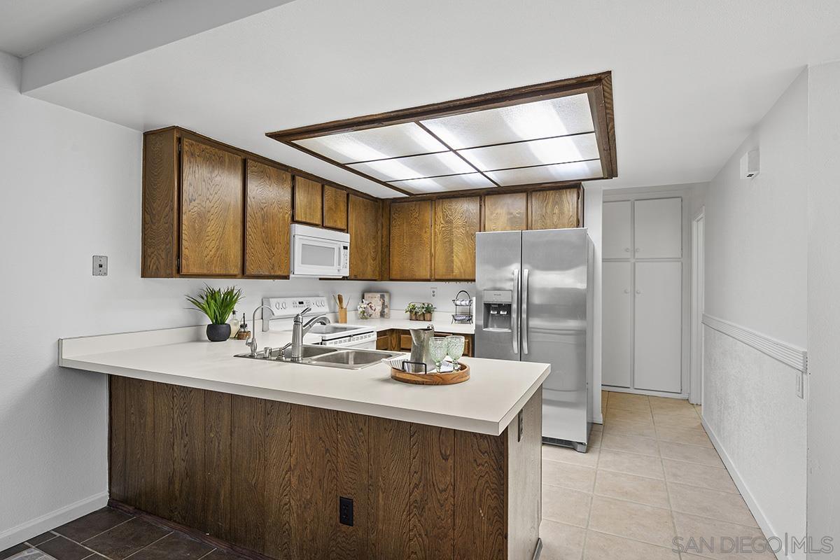 Detail Gallery Image 8 of 54 For 9787  Rimpark Way, San Diego,  CA 92124 - 4 Beds | 2/1 Baths